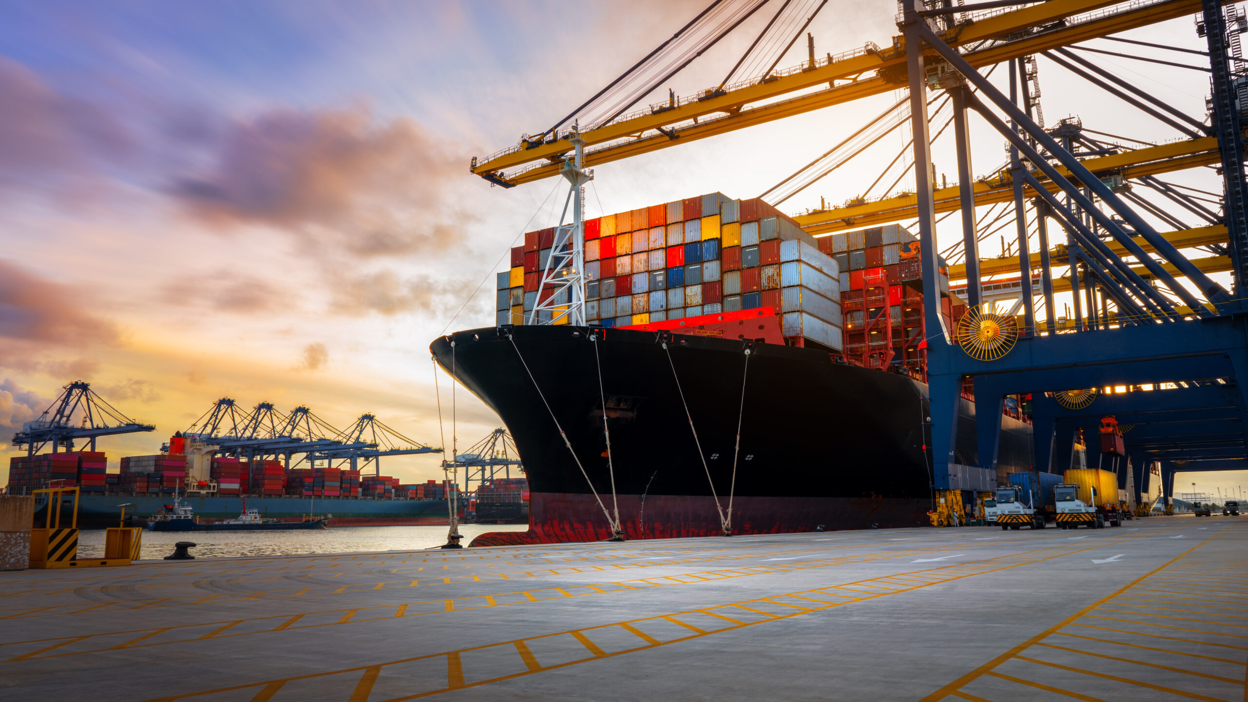 Crane loading cargo onto a boat