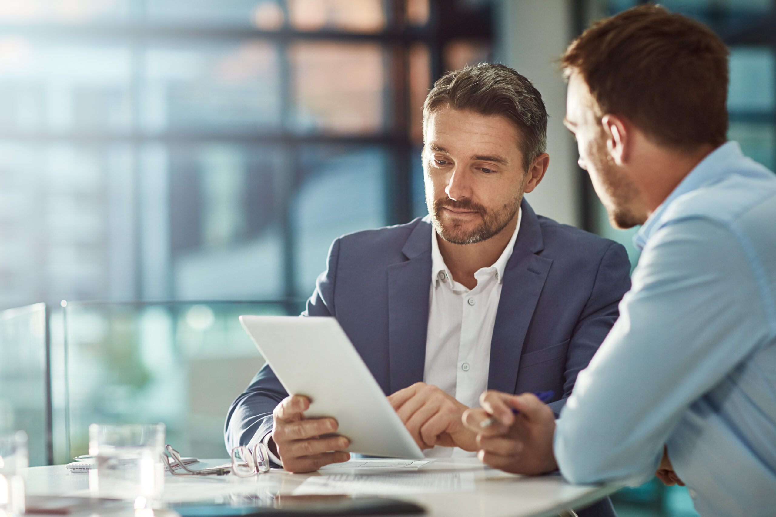 Two men discussing business