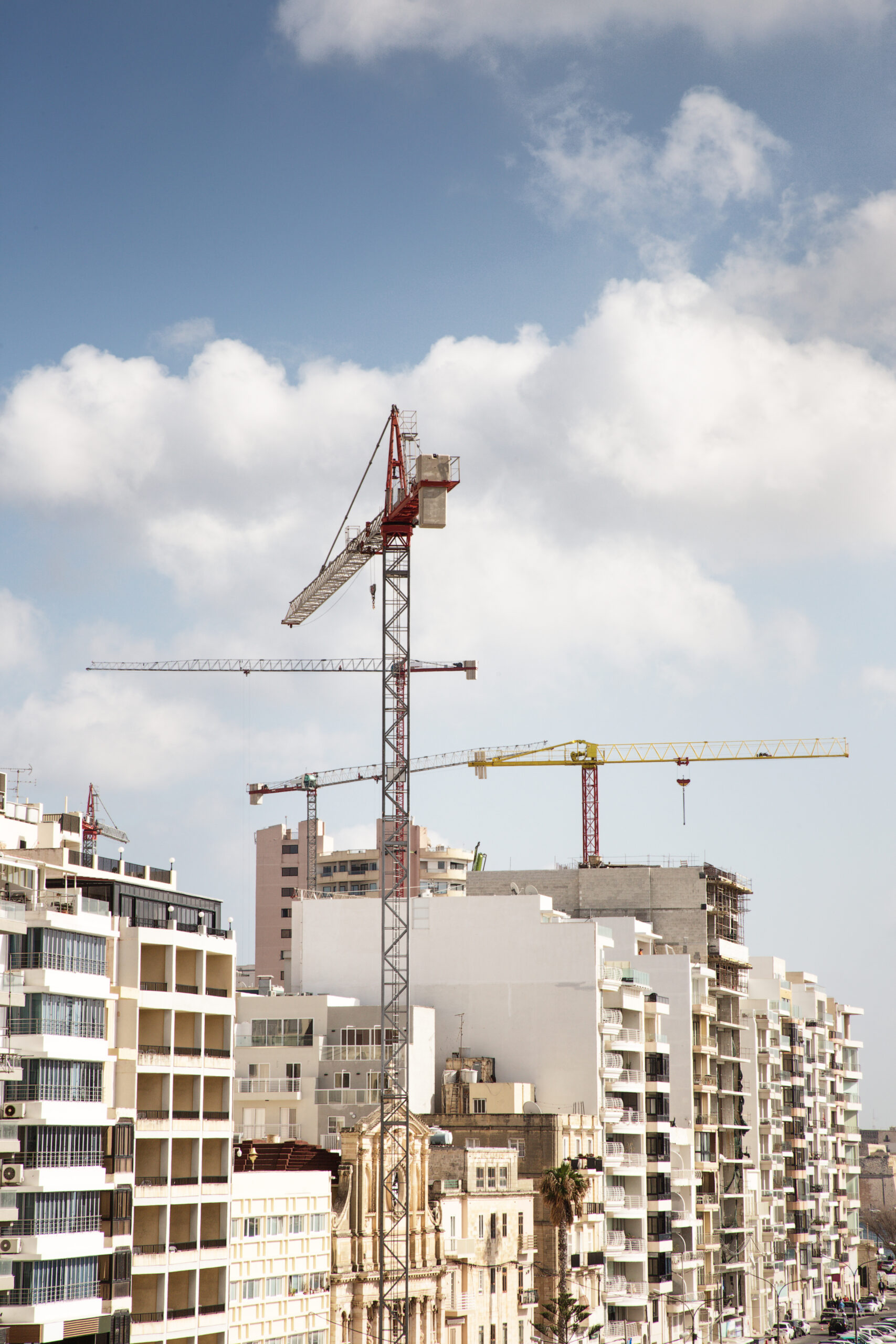 Construction work being done to high rise buildings
