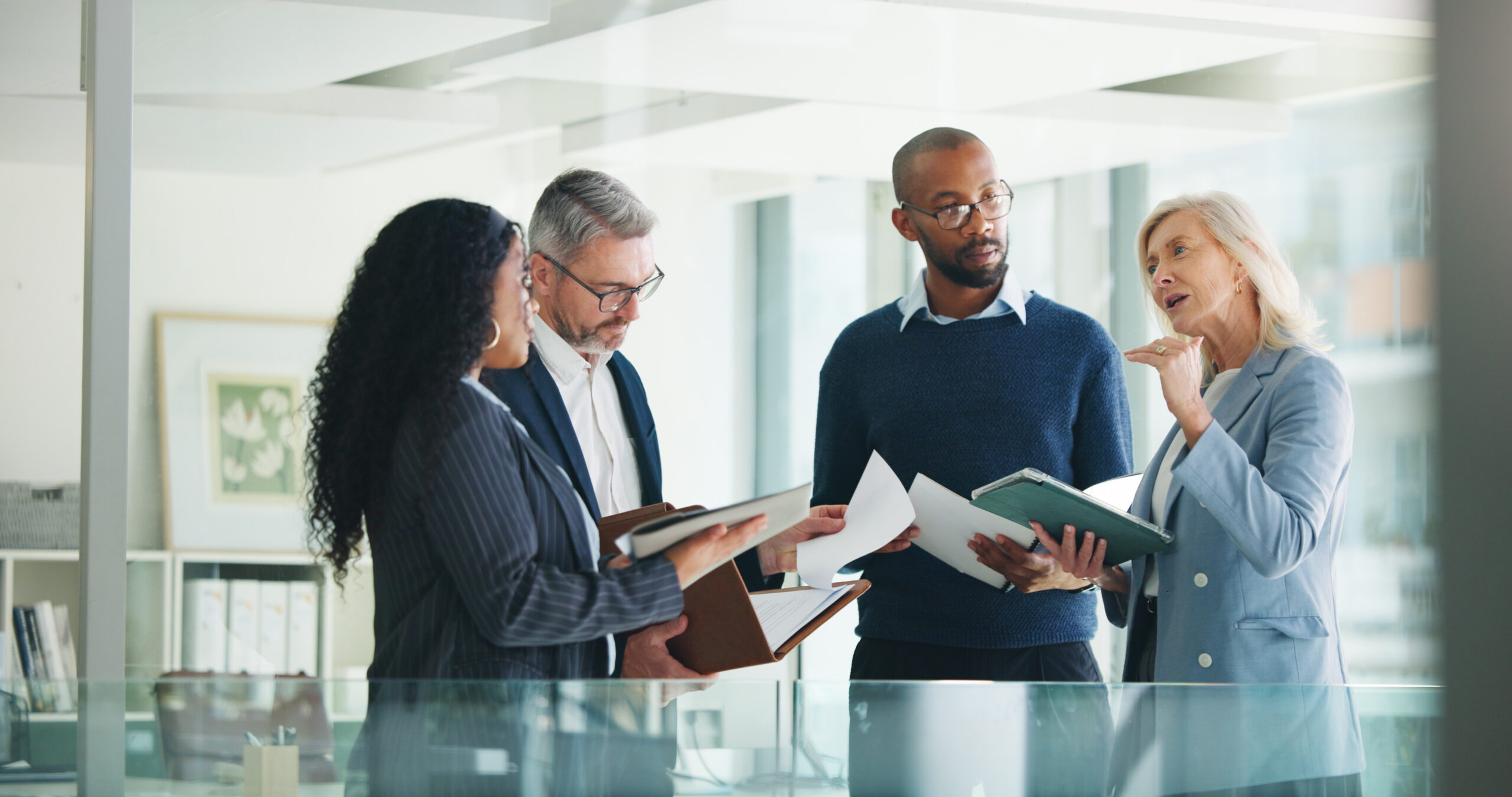 Group of people in a business setting talking