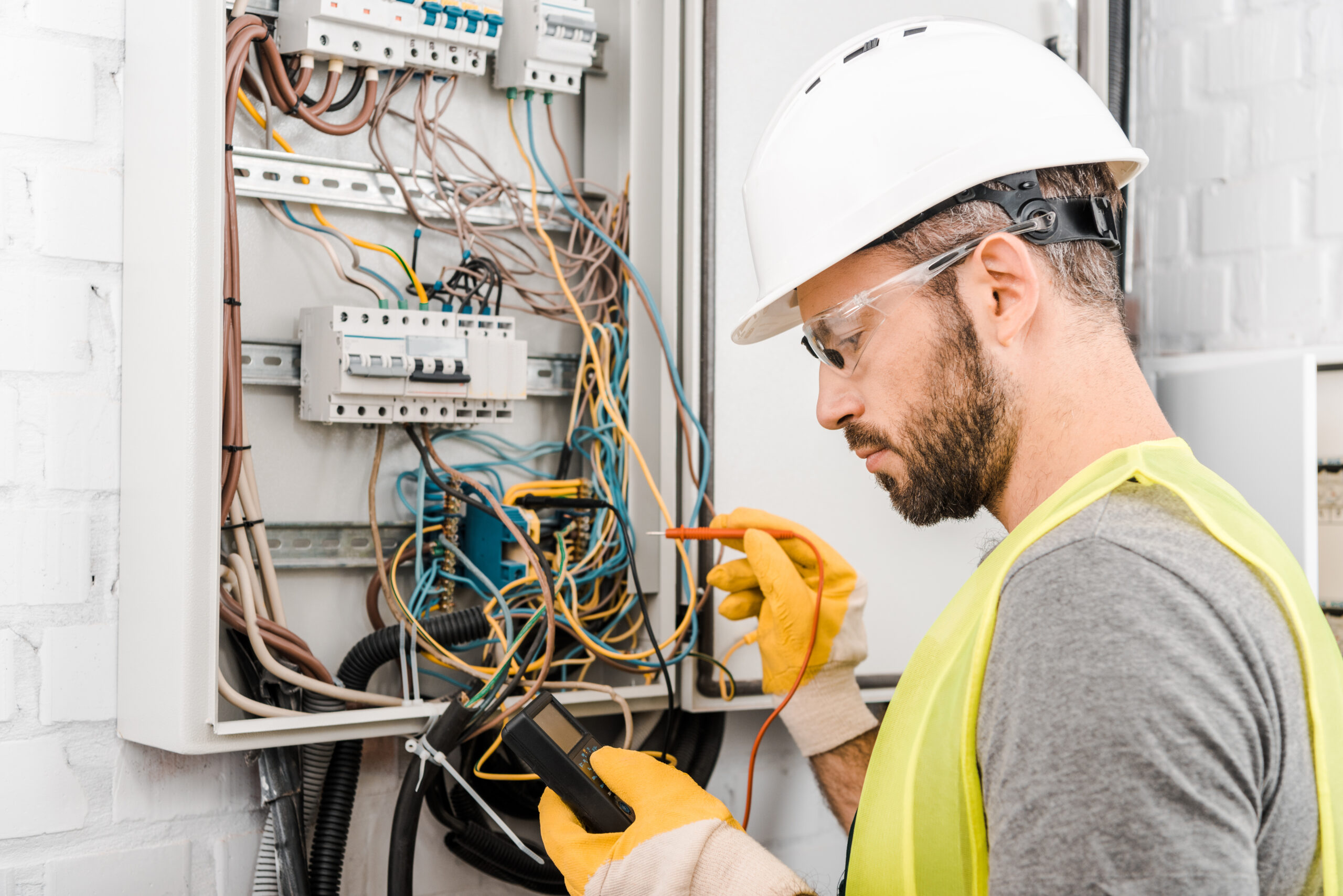 Electrician working on electrical box